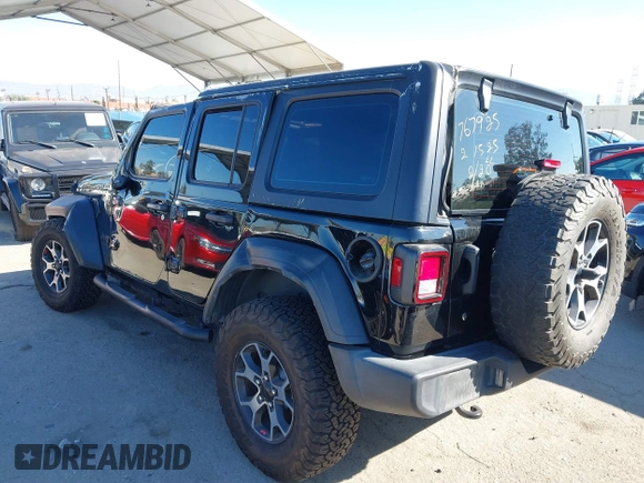 2023 Jeep Wrangler Willys with VIN 1C4HJXDN0PW597768, listed as a IAAI auction lot 41645815 with 23,717 mi miles and . Bid and sale history available at DreamBid. Image 3.