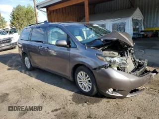 2014 Toyota Sienna XLE z VIN 5TDYK3DC6ES524504, wystawiony jako Copart lot #56509235 z przebiegiem Nie podano mil oraz Szkoda całkowita • Salvage title. Historia ofert i sprzedaży dostępna na DreamBid. Obrazek 4.