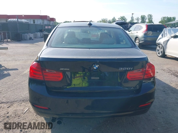 2014 BMW 3 Series 328i xDrive with VIN WBA3B5G56ENS06890, listed as a IAAI auction lot 42168982 with 133,664 mi miles. Bid and sale history available at carsss.com. Image 16.