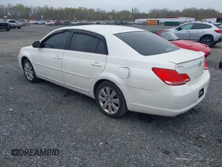 2007 Toyota Avalon XL with VIN 4T1BK36B17U199524, listed as a IAAI auction lot 42005419 with 237,086 mi miles and . Bid and sale history available at carsss.com. Image 3.