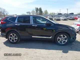 2018 Honda CR-V EX with VIN 7FARW1H53JE052029, listed as a IAAI auction lot 41890820 with 125,043 mi miles. Bid and sale history available at carsss.com. Image 13.