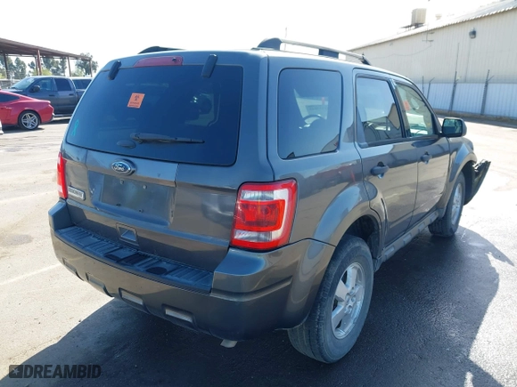 2012 Ford Escape XLT with VIN 1FMCU0D78CKC45514, listed as a IAAI auction lot 41937043 with 162,601 mi miles. Bid and sale history available at carsss.com. Image 4.