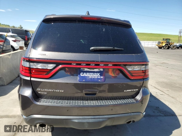 2014 Dodge Durango Limited z VIN 1C4SDJDT9EC394501, wystawiony jako Copart lot #58161754 z przebiegiem 86 066 mil mil oraz Czysty tytuł • Clean title. Historia ofert i sprzedaży dostępna na DreamBid. Obrazek 6.