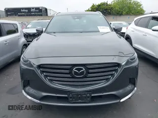 2018 Mazda CX-9 Grand Touring with VIN JM3TCBDY1J0200183, listed as a IAAI auction lot 42408132 with 69,023 mi miles and . Bid and sale history available at DreamBid. Image 13.