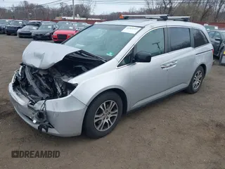 2013 Honda Odyssey EX-L with VIN 5FNRL5H65DB050789, listed as a IAAI auction lot 41911537 with 160,348 mi miles and . Bid and sale history available at carsss.com. Image 18.