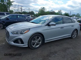 2019 Hyundai Sonata Sport z VIN 5NPE34AFXKH740037, wystawiony jako IAAI lot #42215038 z przebiegiem 79 714 mil mil oraz . Historia ofert i sprzedaży dostępna na DreamBid. Obrazek 2.