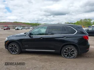 2016 BMW X5 xDrive35i z VIN 5UXKR0C59G0S89653, wystawiony jako IAAI lot #42300682 z przebiegiem 130 059 mil mil oraz . Historia ofert i sprzedaży dostępna na DreamBid. Obrazek 14.