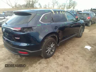 2021 Mazda CX-9 Sport with VIN JM3TCBBY4M0519407, listed as a IAAI auction lot 40883497 with 90,205 mi miles and . Bid and sale history available at carsss.com. Image 4.
