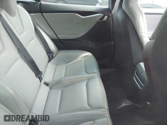 2014 Tesla Model S P85D with VIN 5YJSA1H29EFP63032, listed as a IAAI auction lot 42132145 with Not Provided miles and . Bid and sale history available at DreamBid. Image 8.
