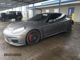 2016 Porsche Panamera GTS z VIN WP0AF2A7XGL080197, wystawiony jako Copart lot #85137674 z przebiegiem 59 951 mil mil oraz Szkoda całkowita • Salvage title. Historia ofert i sprzedaży dostępna na DreamBid. Obrazek 1.