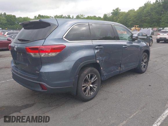 2018 Toyota Highlander LE with VIN 5TDBZRFH8JS875311, listed as a IAAI auction lot 42673189 with 180,025 mi miles and . Bid and sale history available at DreamBid. Image 4.