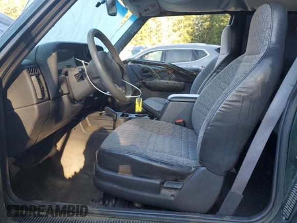 1999 Jeep Cherokee SE with VIN 1J4FF27S9XL667941, listed as a Copart auction lot 42429785 with 121,490 mi miles and Salvage title. Bid and sale history available at DreamBid. Image 7.