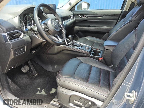2024 Mazda CX-5 S Carbon Edition z VIN JM3KFBCL3R0481732, wystawiony jako Copart lot #56997135 z przebiegiem 32 887 mil mil oraz Tytuł czysty. Historia ofert i sprzedaży dostępna na DreamBid. Obrazek 7.