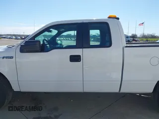 2014 Ford F-150 XL with VIN 1FTEX1CM4EKE58061, listed as a IAAI auction lot 41669258 with 195,232 mi miles. Bid and sale history available at carsss.com. Image 13.
