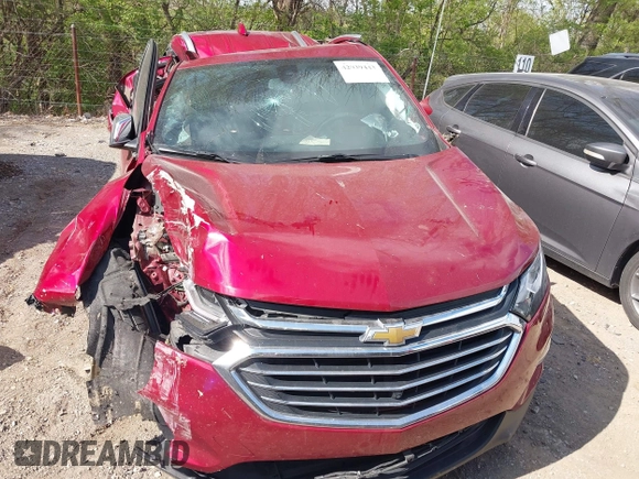 2021 Chevrolet Equinox Premier z VIN 2GNAXNEV7M6140889, wystawiony jako IAAI lot #42039443 z przebiegiem 101 767 mil mil oraz . Historia ofert i sprzedaży dostępna na DreamBid. Obrazek 11.
