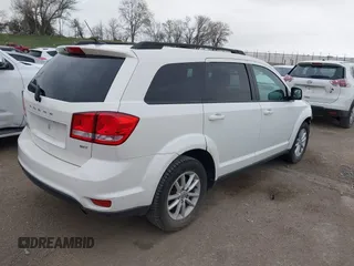 2014 Dodge Journey SXT z VIN 3C4PDCBB9ET222226, wystawiony jako IAAI lot #42056579 z przebiegiem 105 139 mil mil oraz . Historia ofert i sprzedaży dostępna na DreamBid. Obrazek 4.