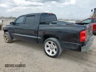 2005 Dodge Dakota ST z VIN 1D7HE28K35S235225, wystawiony jako Copart lot #57684725 z przebiegiem 184 546 mil mil oraz Szkoda całkowita • Salvage title. Historia ofert i sprzedaży dostępna na DreamBid. Obrazek 2.