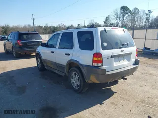 2004 Ford Escape XLT with VIN 1FMYU93174KA45992, listed as a IAAI auction lot 41169340 with 308,987 mi miles. Bid and sale history available at carsss.com. Image 3.