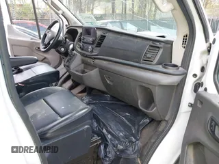2021 Ford Transit Cargo with VIN 1FTBR1C85MKA48173, listed as a IAAI auction lot 42005472 with 81,980 mi miles and . Bid and sale history available at DreamBid. Image 5.