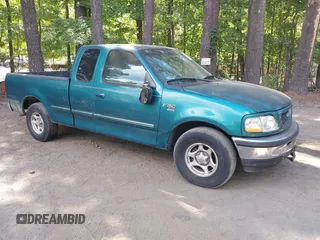 1998 Ford F-150 XL with VIN 1FTRX17L2WNA14048, listed as a IAAI auction lot 42647951 with 217,874 mi miles and . Bid and sale history available at DreamBid. Image 1.
