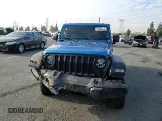 2022 Jeep Wrangler Unlimited Willys with VIN 1C4HJXDM0NW152614, listed as a Copart auction lot 83208664 with 51,913 mi miles and Salvage Title. Bid and sale history available at DreamBid. Image 10.