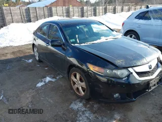 2009 Acura TSX with VIN JH4CU26639C017121, listed as a IAAI auction lot 41415582 with 273,583 mi miles. Bid and sale history available at carsss.com. Image 1.