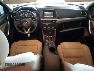 2016 Mazda CX-5 Touring with VIN JM3KE2CY7G0653854, listed as a Copart auction lot 74825564 with 139,193 mi miles and Salvage Title. Bid and sale history available at DreamBid. Image 8.