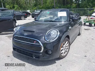 2021 MINI Convertible Cooper S z VIN WMWWJ5C0XM3M08622, wystawiony jako IAAI lot #42507679 z przebiegiem 36 932 mil mil oraz . Historia ofert i sprzedaży dostępna na DreamBid. Obrazek 17.