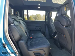 2024 Rivian R1S Adventure with VIN 7PDSGCBA7RN037664, listed as a Copart auction lot 49236015 with 16,496 mi miles and Salvage Title. Bid and sale history available at carsss.com. Image 11.