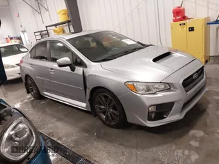 2016 Subaru WRX Premium with VIN JF1VA1E64G8811369, listed as a IAAI auction lot 41243335 with 129,319 mi miles. Bid and sale history available at carsss.com. Image 1.
