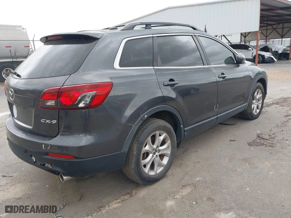 2015 Mazda CX-9 Touring with VIN JM3TB2CA5F0467339, listed as a IAAI auction lot 41840086 with 108,448 mi miles. Bid and sale history available at carsss.com. Image 4.