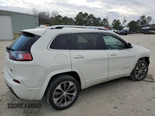 2019 Jeep Cherokee with VIN 1C4PJLJX3KD381640, listed as a Copart auction lot 42463593 with 28,310 mi miles and . Bid and sale history available at DreamBid. Image 3.