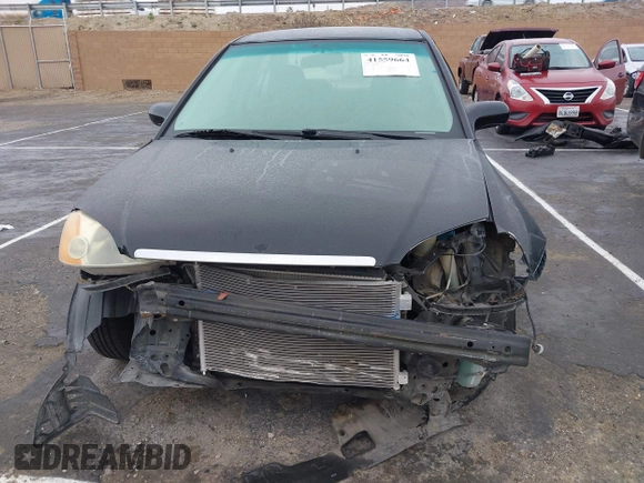 2001 Honda Civic DX with VIN 2HGES15221H525334, listed as a IAAI auction lot 41559664 with 309,641 mi miles. Bid and sale history available at carsss.com. Image 6.