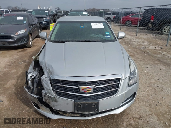2018 Cadillac ATS RWD z VIN 1G6AA5RX5J0178702, wystawiony jako IAAI lot #41522724 z przebiegiem 79 502 mil mil oraz . Historia ofert i sprzedaży dostępna na DreamBid. Obrazek 12.