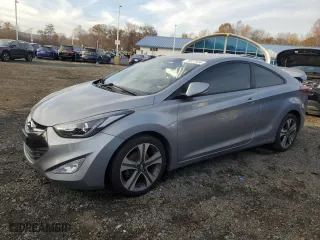 2014 Hyundai Elantra Coupe with VIN KMHDH6AH9EU026450, listed as a Copart auction lot 78877434 with 156,927 mi miles and Clean Title. Bid and sale history available at carsss.com. Image 1.