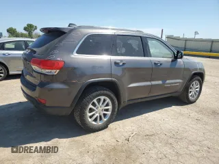 2016 Jeep Grand Cherokee Laredo with VIN 1C4RJFAG2GC328841, listed as a Copart auction lot 63553435 with 100,472 mi miles and Salvage title. Bid and sale history available at DreamBid. Image 3.