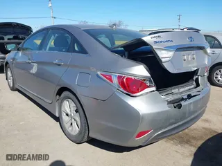 2013 Hyundai Sonata Hybrid Limited with VIN KMHEC4A4XDA096060, listed as a IAAI auction lot 41670337 with 159,185 mi miles. Bid and sale history available at carsss.com. Image 3.