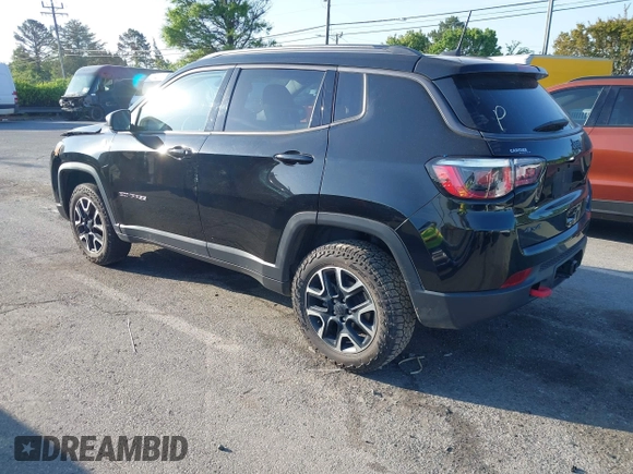 2019 Jeep Compass Trailhawk with VIN 3C4NJDDB5KT800515, listed as a IAAI auction lot 42059594 with 60,338 mi miles and . Bid and sale history available at DreamBid. Image 3.