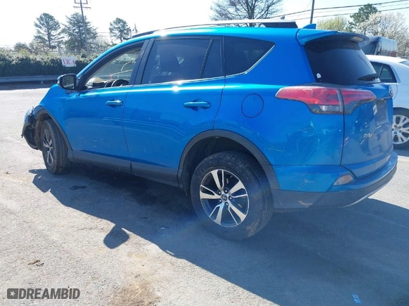 2018 Toyota RAV4 XLE with VIN JTMWFREV7JJ730968, listed as a IAAI auction lot 41778761 with 122,102 mi miles. Bid and sale history available at carsss.com. Image 3.