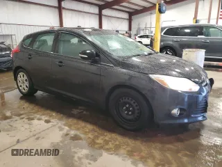 2012 Ford Focus SE z VIN 1FAHP3K24CL407570, wystawiony jako Copart lot #56002135 z przebiegiem 122 730 mil mil oraz Szkoda całkowita • Salvage title. Historia ofert i sprzedaży dostępna na DreamBid. Obrazek 4.