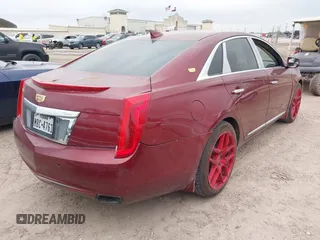 2017 Cadillac XTS Luxury with VIN 2G61M5S36H9134285, listed as a IAAI auction lot 42076660 with 197,985 mi miles. Bid and sale history available at carsss.com. Image 4.