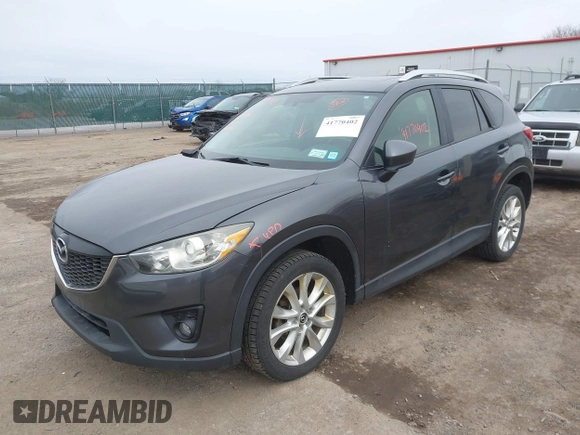 2014 Mazda CX-5 Grand Touring with VIN JM3KE4DY4E0343863, listed as a IAAI auction lot 41770402 with 117,615 mi miles. Bid and sale history available at carsss.com. Image 17.