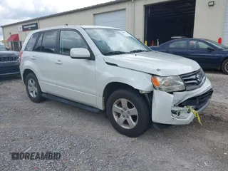 2013 Suzuki Grand Vitara Premium with VIN JS3TE0D68D4100201, listed as a IAAI auction lot 42694457 with 126,585 mi miles and . Bid and sale history available at DreamBid. Image 1.