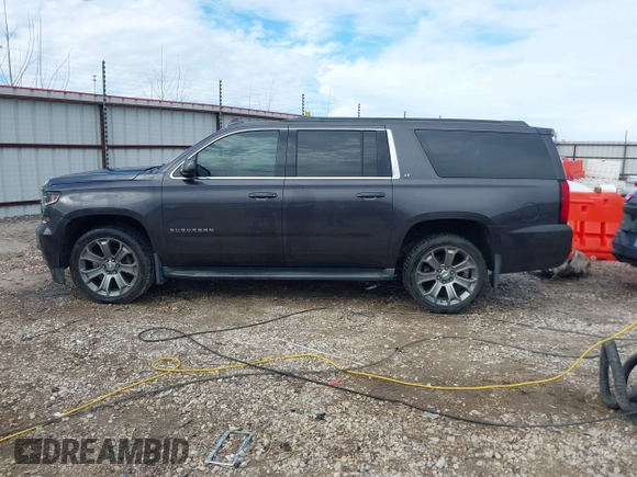 2015 Chevrolet Suburban LT with VIN 1GNSKJKC8FR717435, listed as a IAAI auction lot 41313726 with 120,731 mi miles and . Bid and sale history available at DreamBid. Image 14.