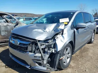 2018 Honda Odyssey EX-L with VIN 5FNRL6H71JB077112, listed as a IAAI auction lot 41721523 with 70,893 mi miles. Bid and sale history available at carsss.com. Image 6.