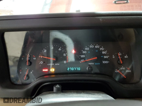 2002 Jeep Wrangler Sahara с VIN 1J4FA59S62P751858, выставлен на аукционе Copart как лот 56638165 с пробегом 270 770 миль миль и Списание • Salvage title. История ставок и продаж доступна на DreamBid. Изображение 9.