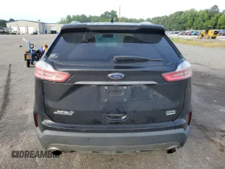 2020 Ford Edge SEL с VIN 2FMPK3J94LBA92154, выставлен на аукционе Copart как лот 65060385 с пробегом 150 187 миль миль и Чистый • Clean title. История ставок и продаж доступна на DreamBid. Изображение 6.