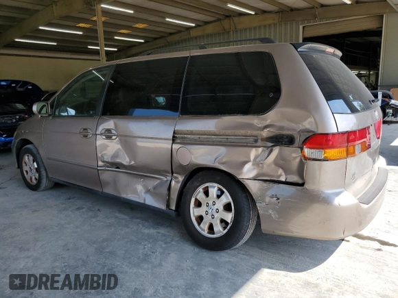 2003 Honda Odyssey EX-L with VIN 5FNRL18963B087397, listed as a Copart auction lot 62392415 with 261,737 mi miles and Salvage title. Bid and sale history available at DreamBid. Image 2.