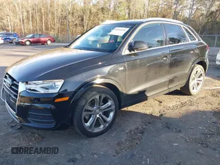 2017 Audi Q3 Premium Plus z VIN WA1JCCFS3HR002400, wystawiony jako IAAI lot #41464520 z przebiegiem 100 560 mil mil oraz . Historia ofert i sprzedaży dostępna na DreamBid. Obrazek 17.