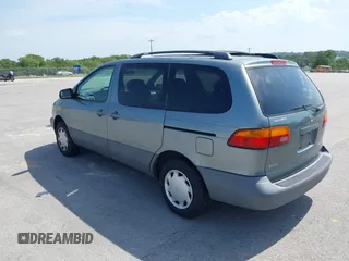 2000 Toyota Sienna LE with VIN 4T3ZF13C4YU211145, listed as a IAAI auction lot 42705612 with 217,825 mi miles and . Bid and sale history available at DreamBid. Image 3.